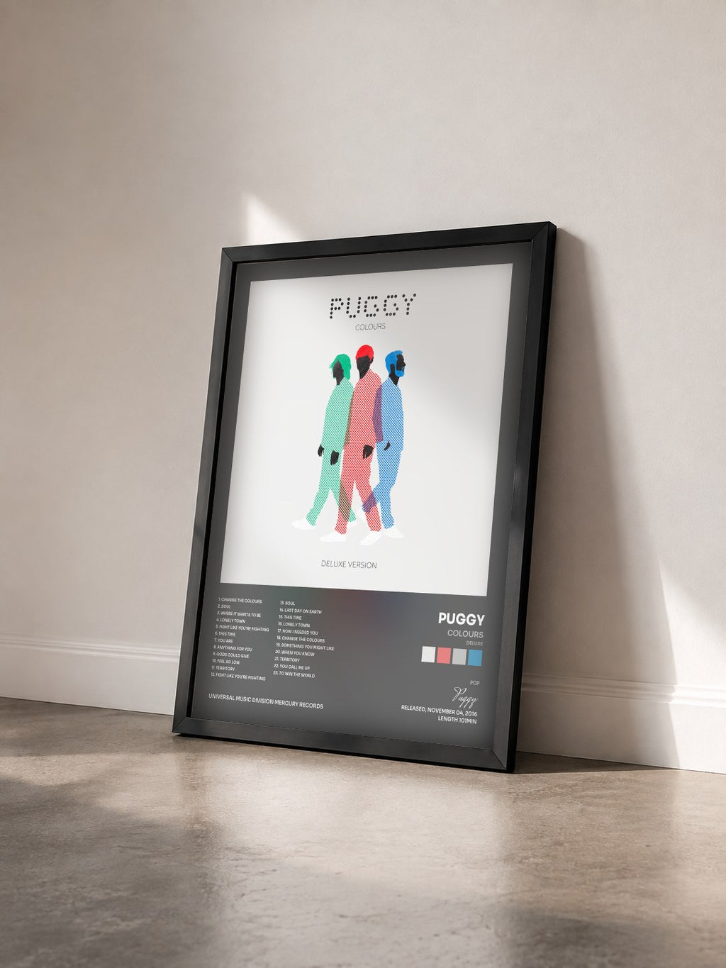 #noir Tableau de l'album Colours (Deluxe) de Puggy vu de trois quarts, cadre noir