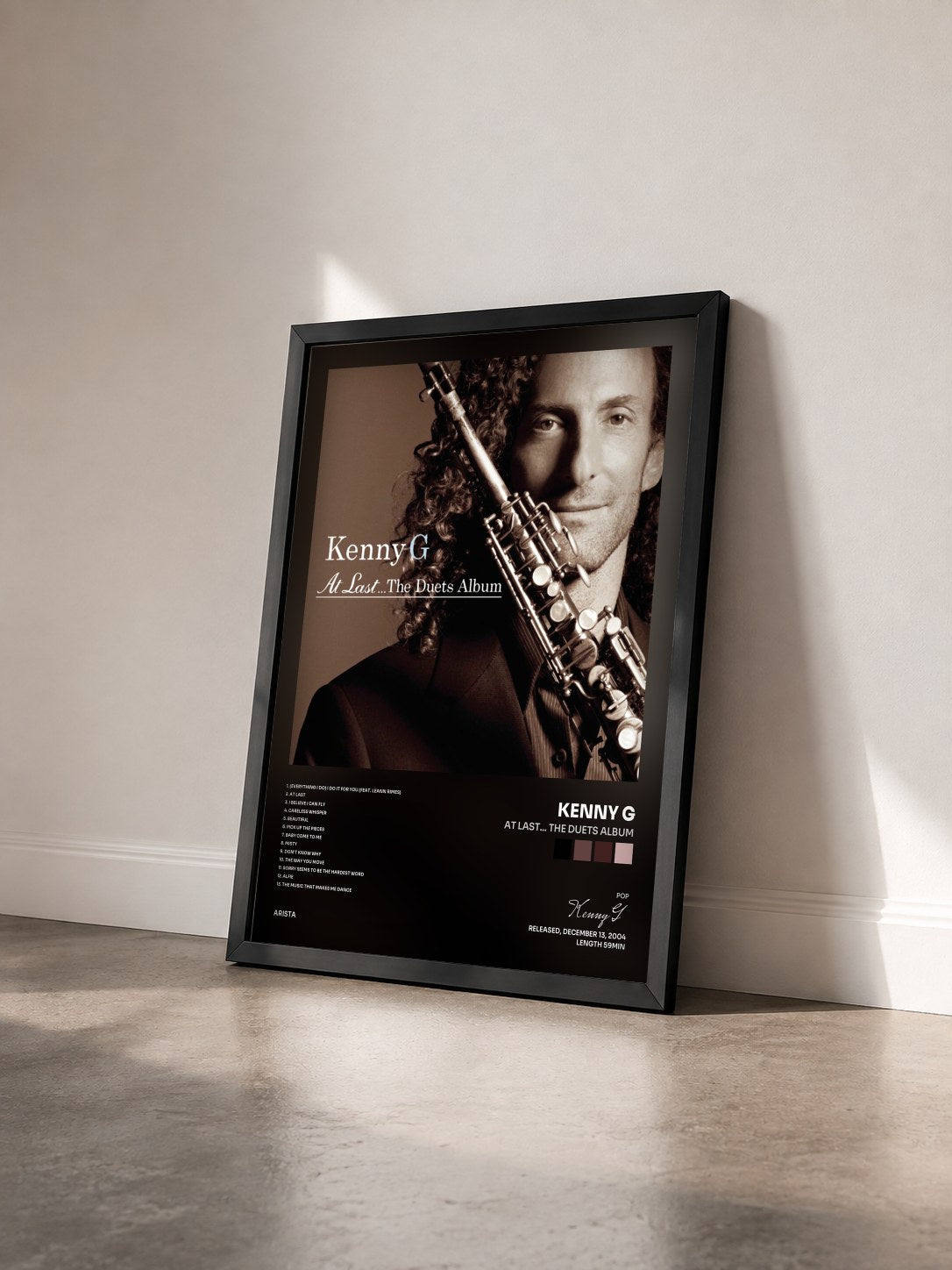 #noir Tableau de l'album At Last... The Duets Album de Kenny G vu de trois quarts, cadre noir