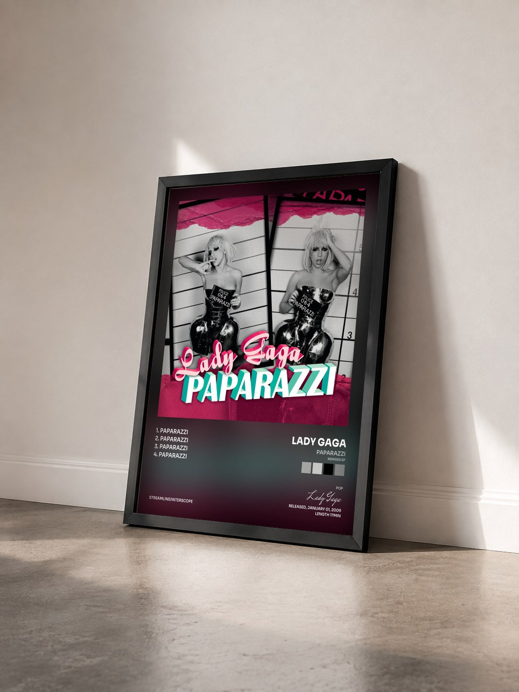 #noir Tableau de l'album Paparazzi (Remixes EP) de Lady Gaga vu de trois quarts, cadre noir