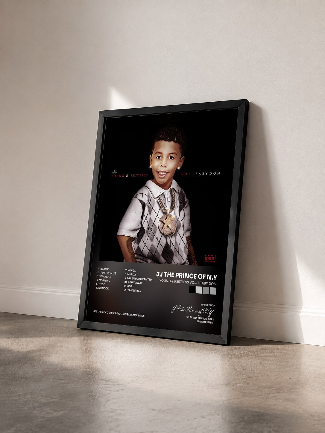 #noir Tableau de l'album Young & Restless Vol. 1 Baby Don de J.I the Prince of N.Y vu de trois quarts, cadre noir