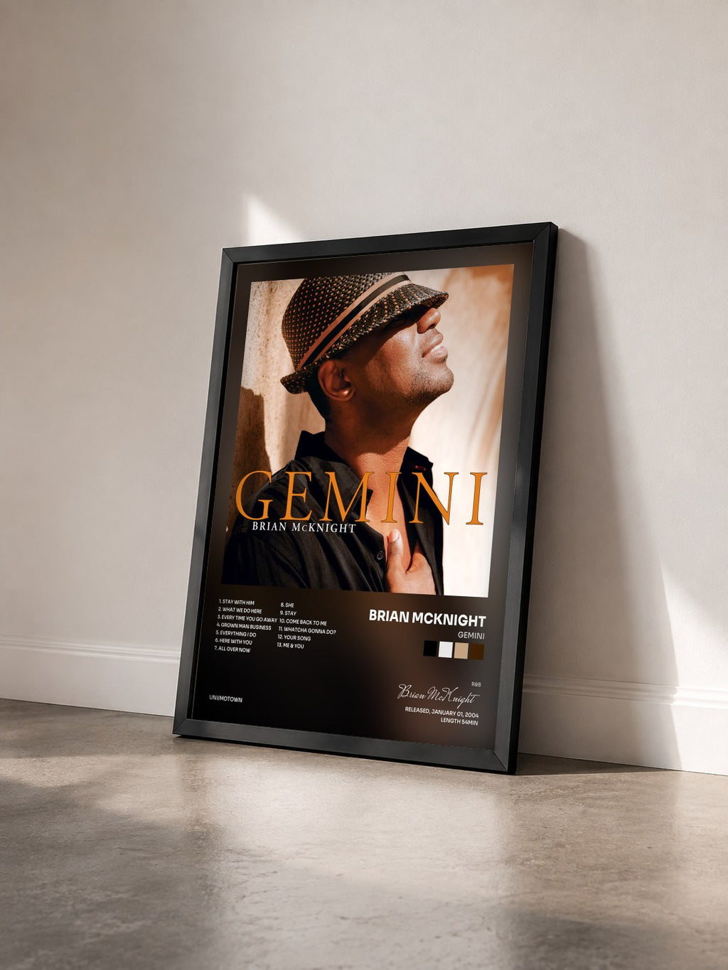 #noir Tableau de l'album Gemini de Brian McKnight vu de trois quarts, cadre noir
