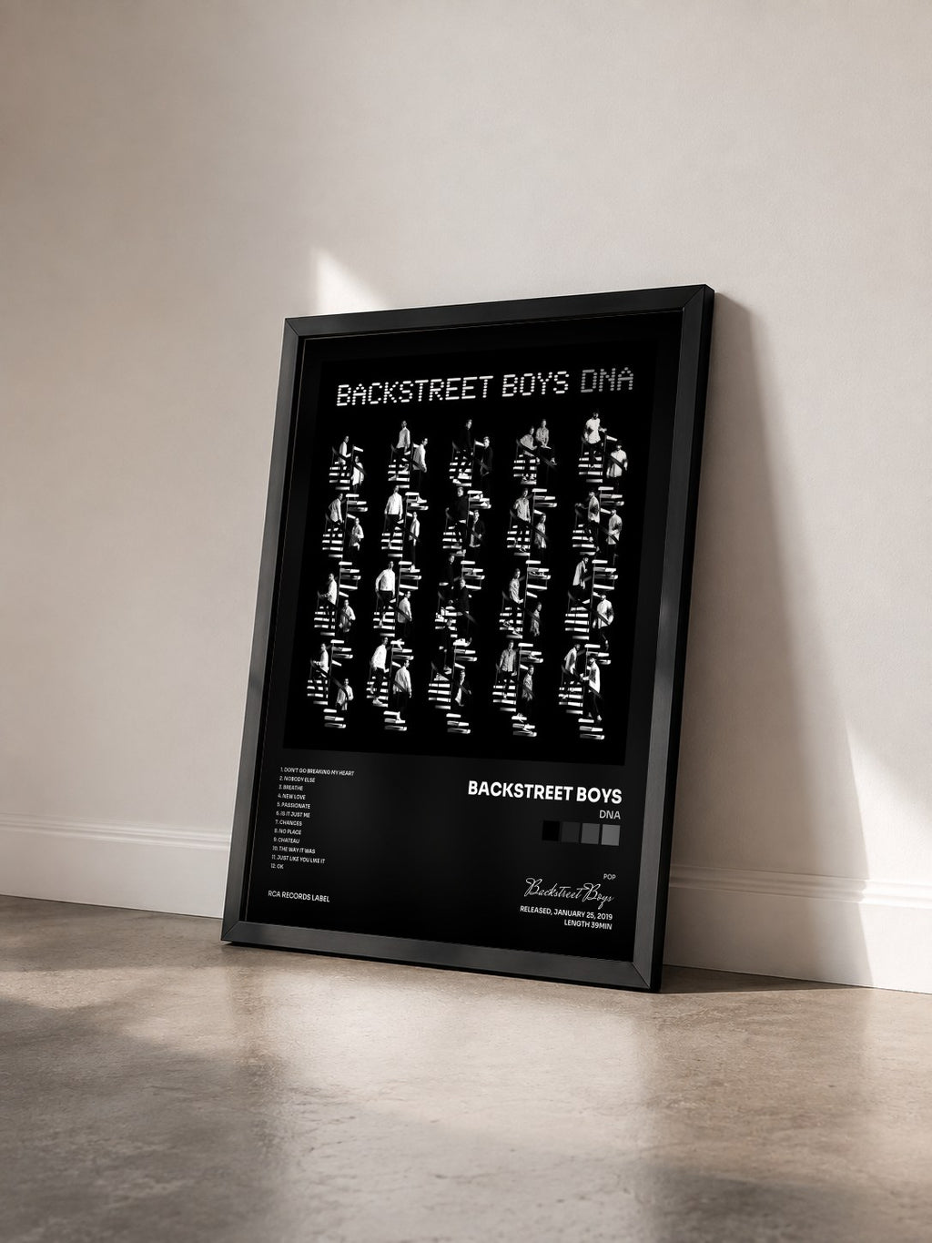 #noir Tableau de l'album DNA de Backstreet Boys vu de trois quarts, cadre noir