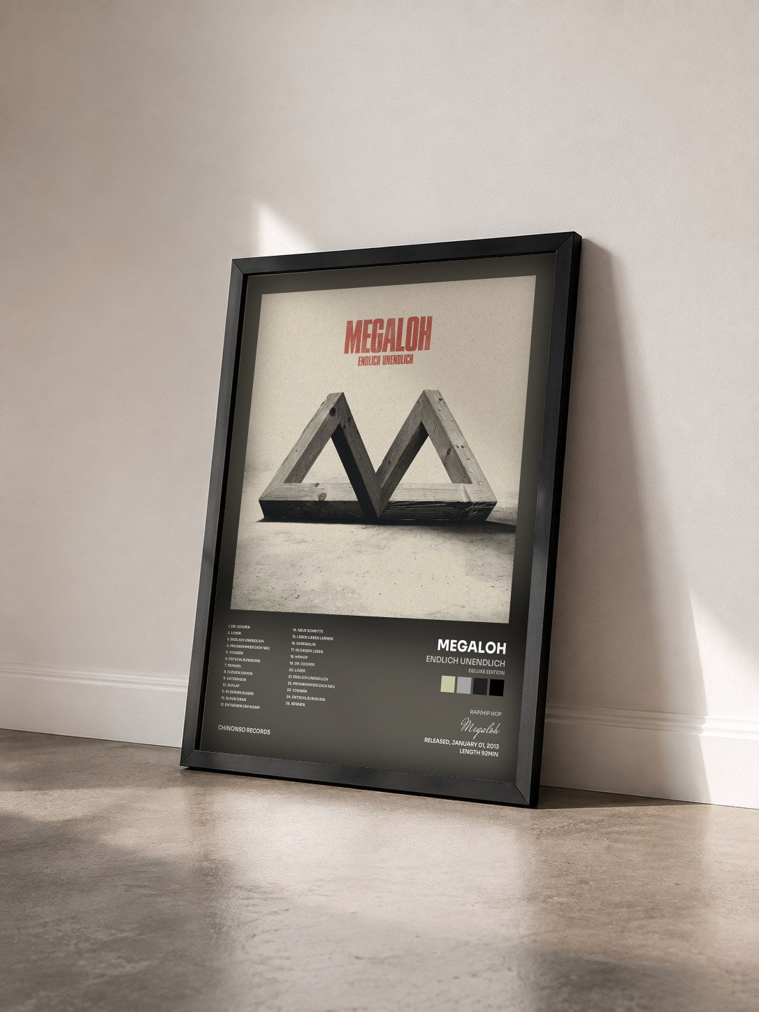 #noir Tableau de l'album Endlich Unendlich (Deluxe Edition) de Megaloh vu de trois quarts, cadre noir
