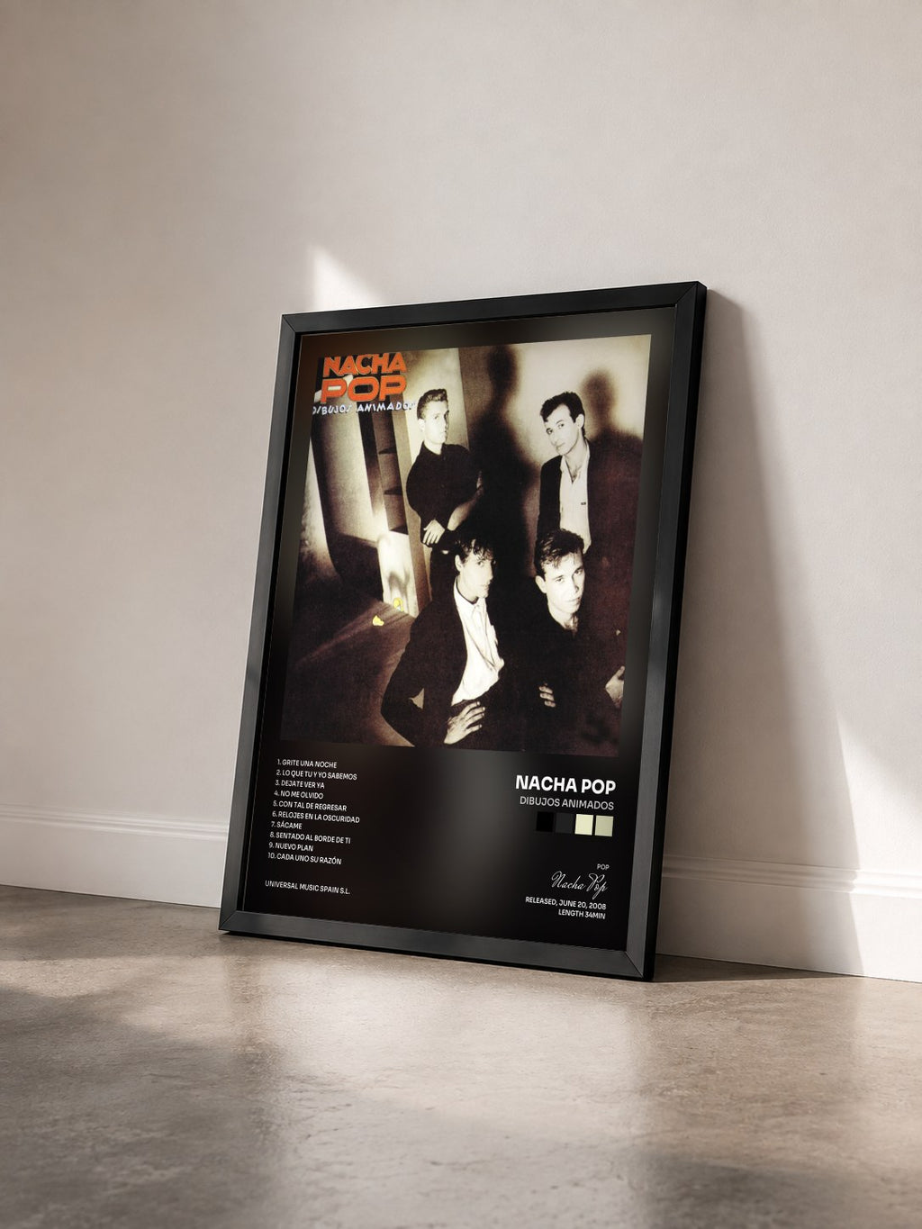 #noir Tableau de l'album Dibujos Animados de Nacha Pop vu de trois quarts, cadre noir