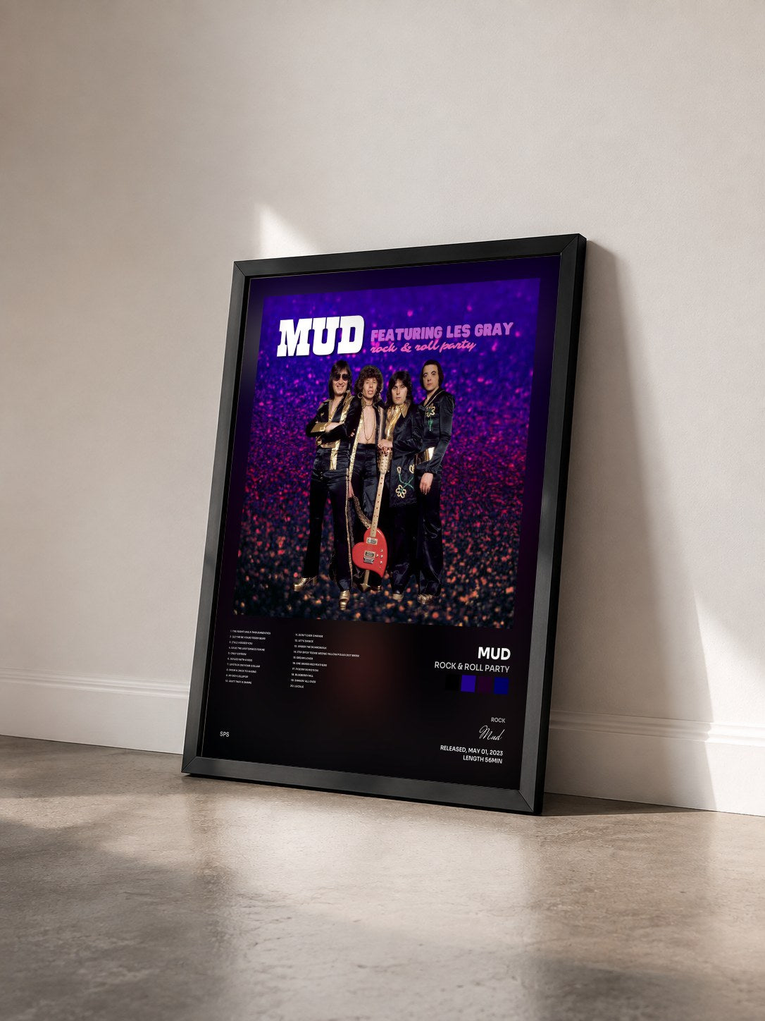 #noir Tableau de l'album Rock & Roll Party de Mud vu de trois quarts, cadre noir