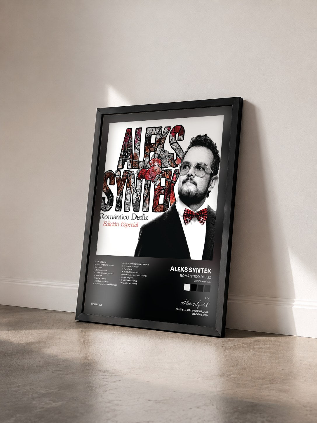 #noir Tableau de l'album Romántico Desliz (Edición Especial) de Aleks Syntek vu de trois quarts, cadre noir