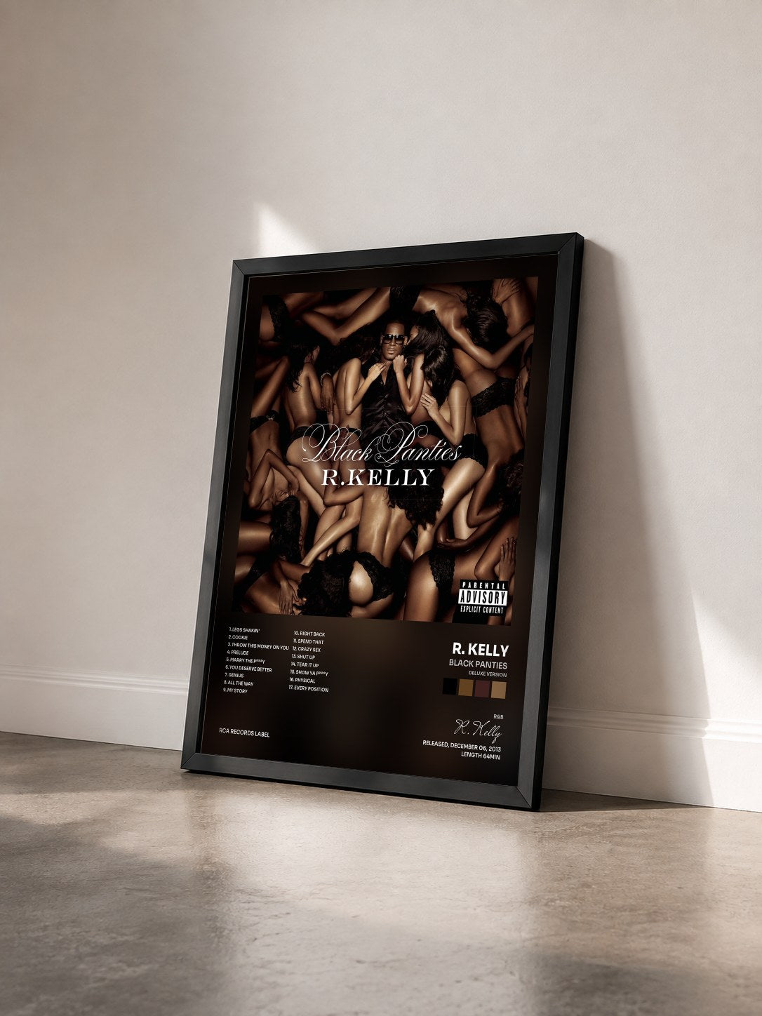 #noir Tableau de l'album Black Panties (Deluxe Version) de R. Kelly vu de trois quarts, cadre noir