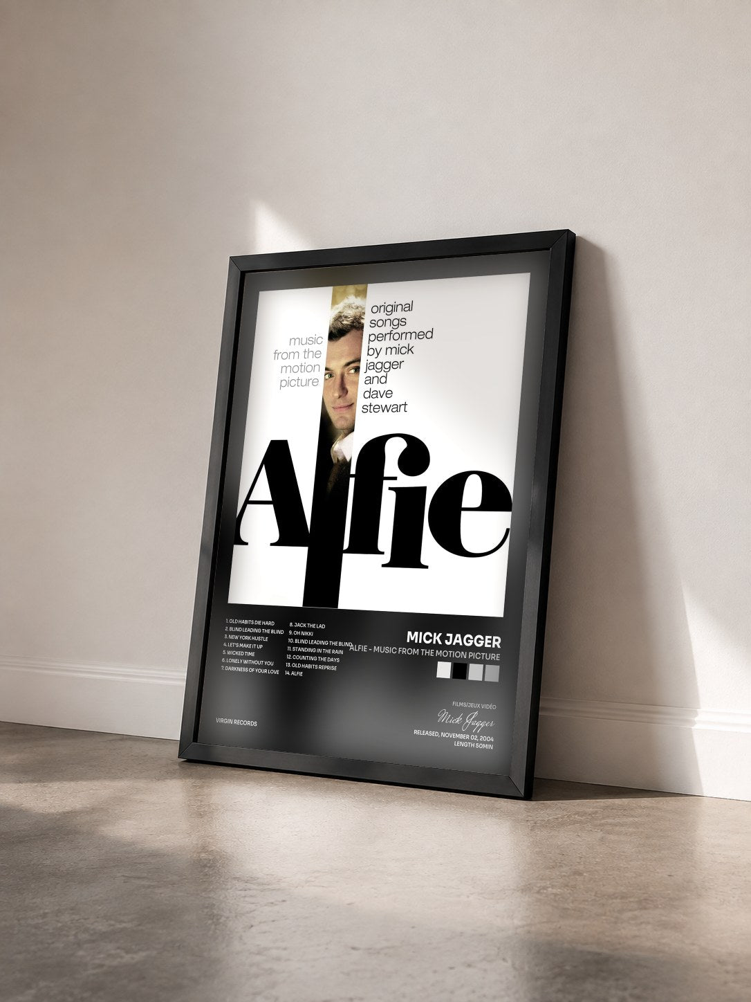 #noir Tableau de l'album Alfie - Music From The Motion Picture de Mick Jagger vu de trois quarts, cadre noir