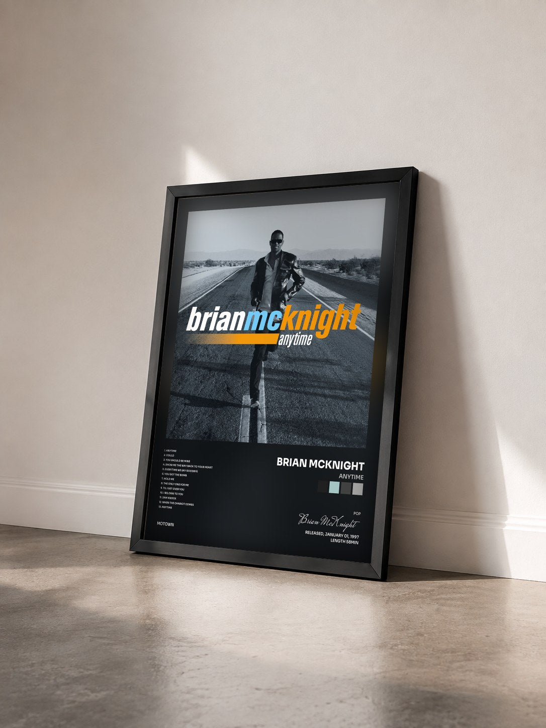 #noir Tableau de l'album Anytime de Brian McKnight vu de trois quarts, cadre noir