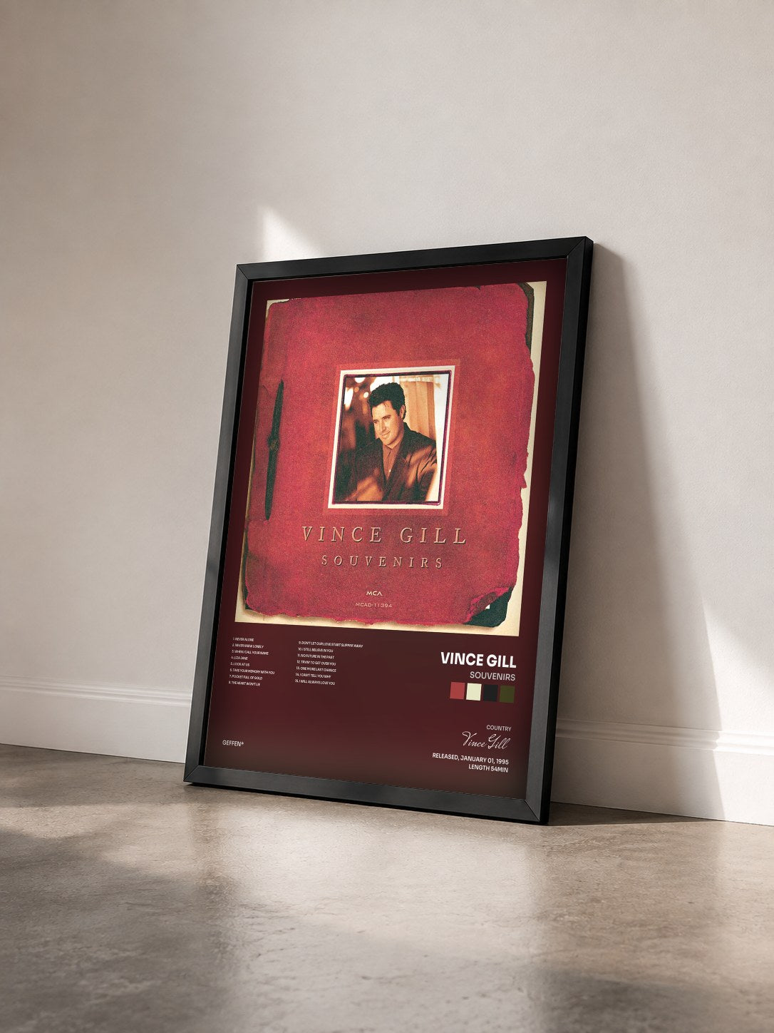 #noir Tableau de l'album Souvenirs de Vince Gill vu de trois quarts, cadre noir