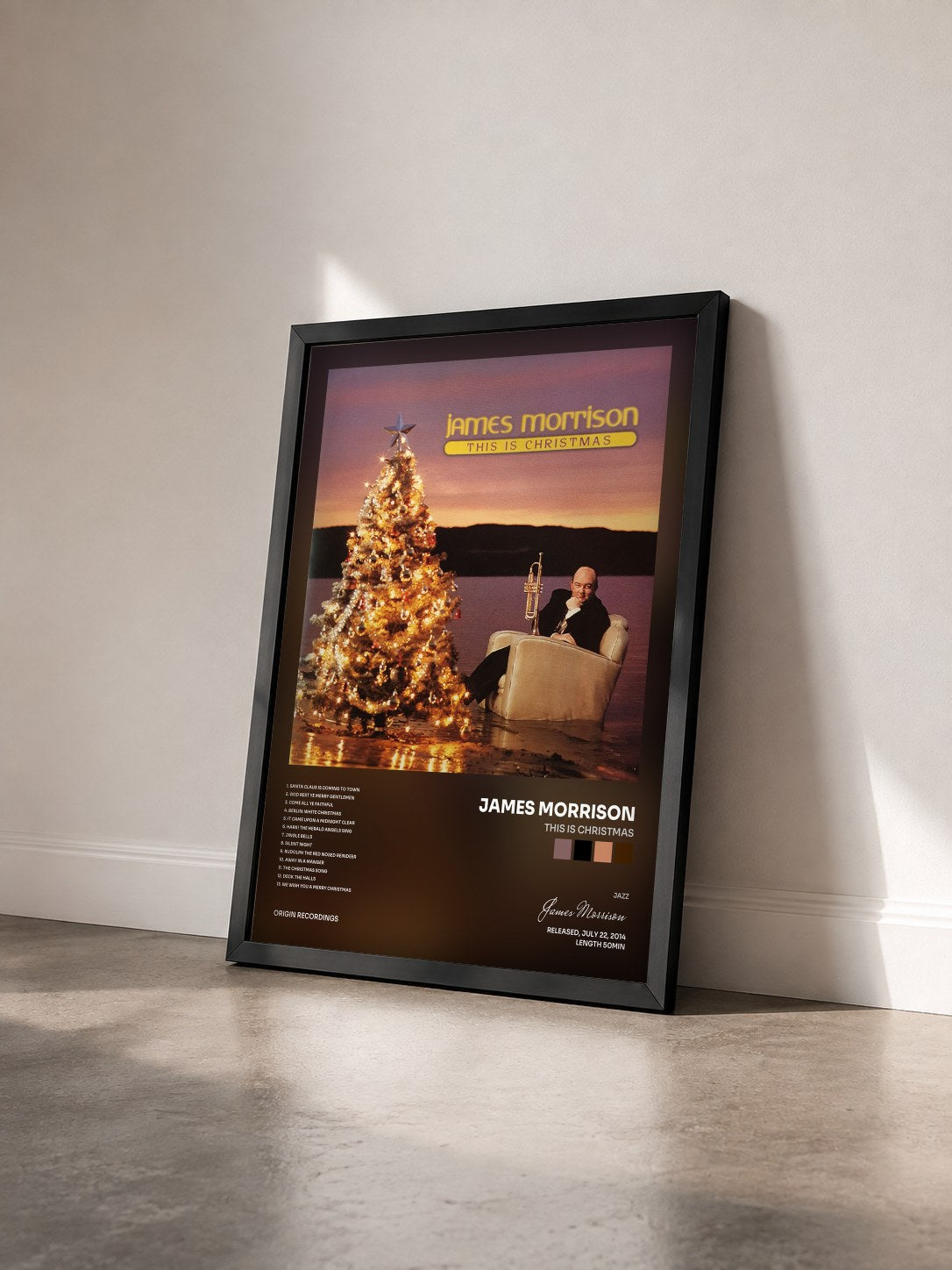 #noir Tableau de l'album This Is Christmas de James Morrison vu de trois quarts, cadre noir