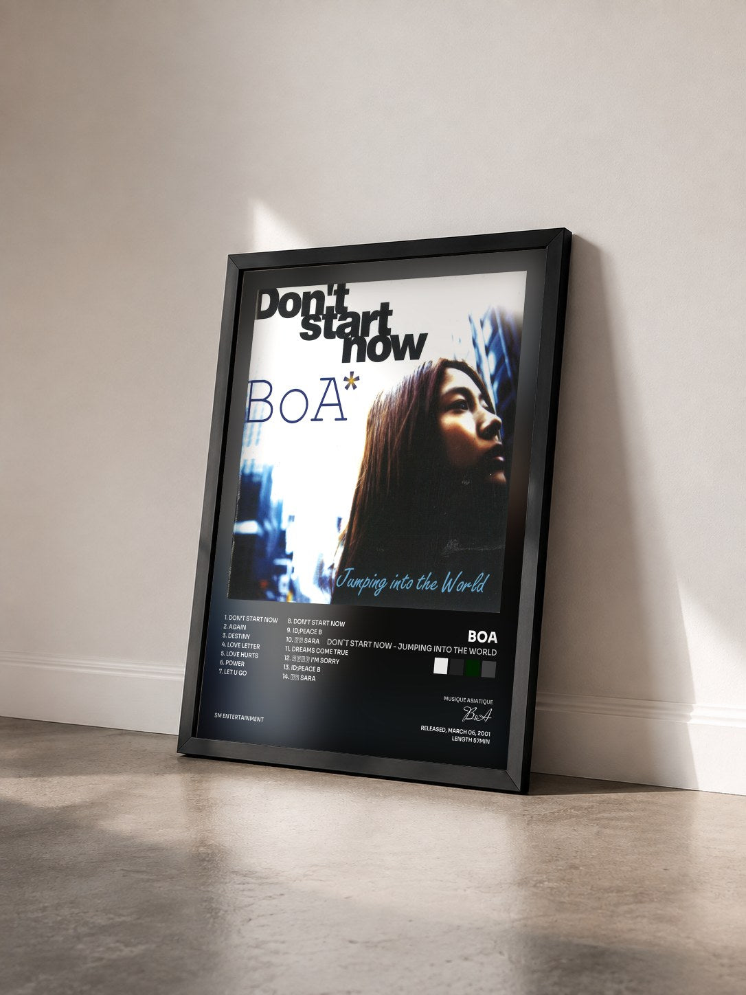 #noir Tableau de l'album Don`t Start Now - Jumping Into The World de BoA vu de trois quarts, cadre noir