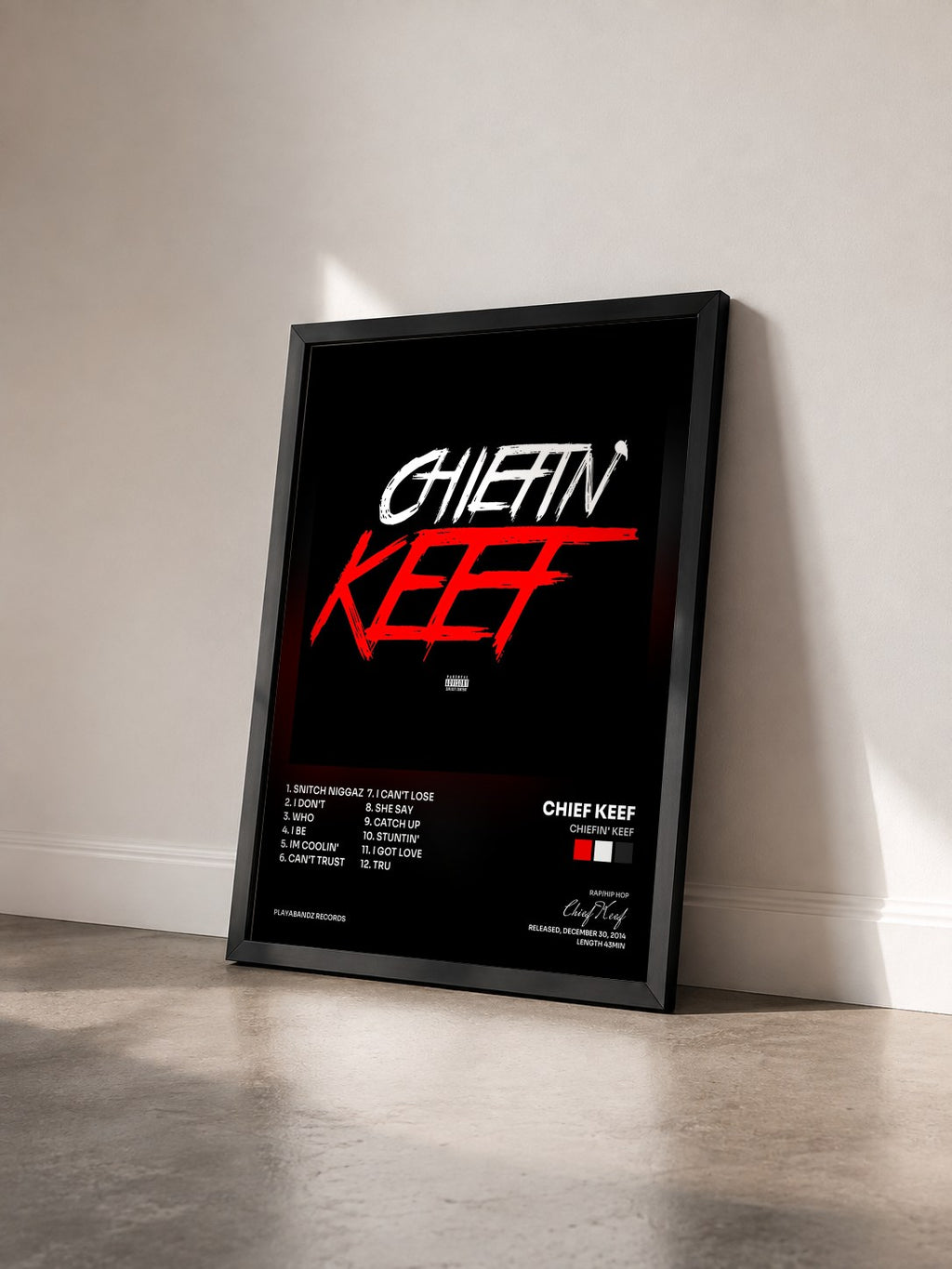 #noir Tableau de l'album Chiefin' Keef de Chief Keef vu de trois quarts, cadre noir