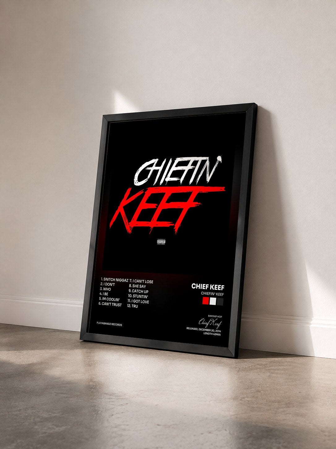 #noir Tableau de l'album Chiefin' Keef de Chief Keef vu de trois quarts, cadre noir