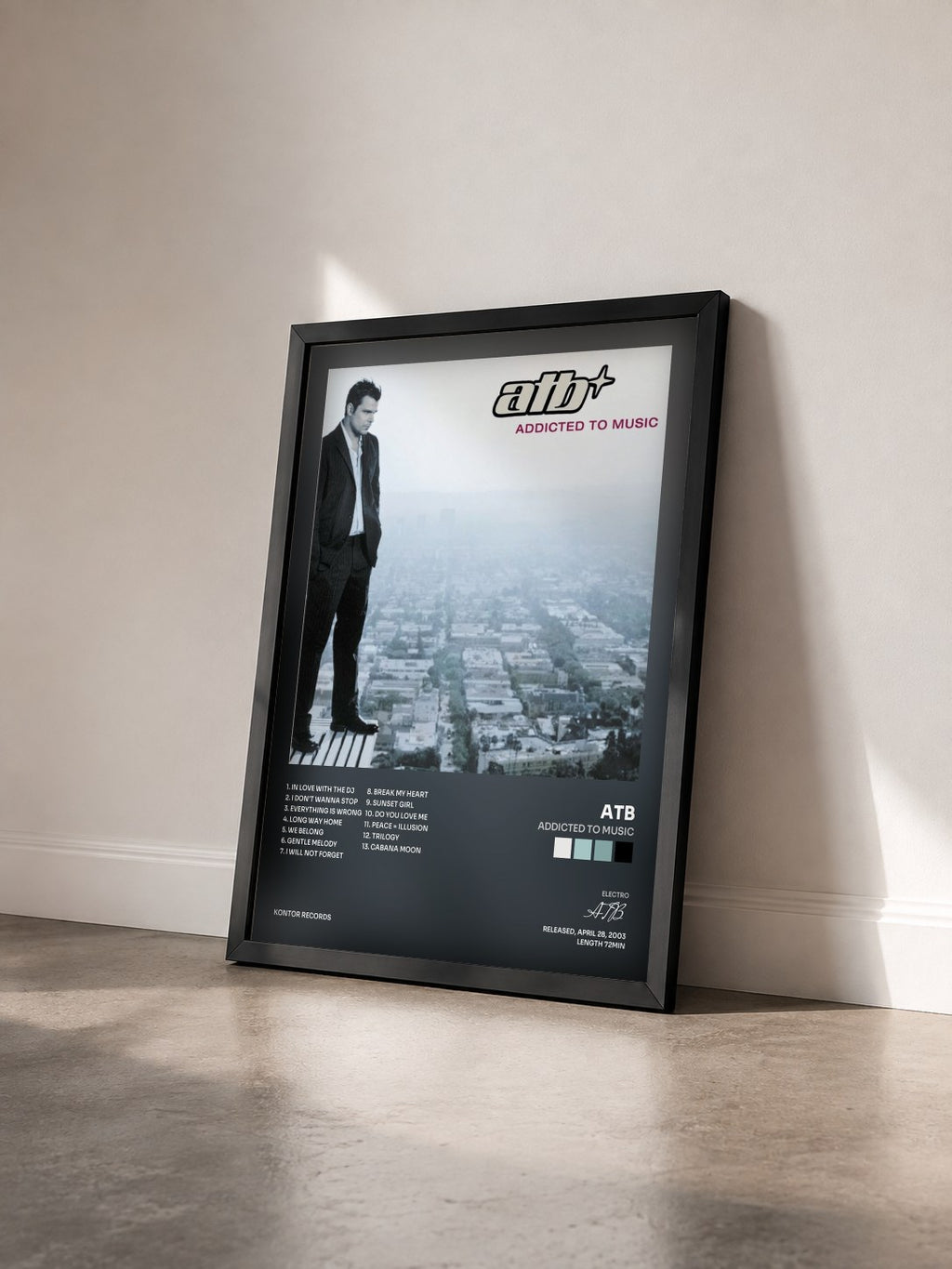 #noir Tableau de l'album Addicted to Music de ATB vu de trois quarts, cadre noir