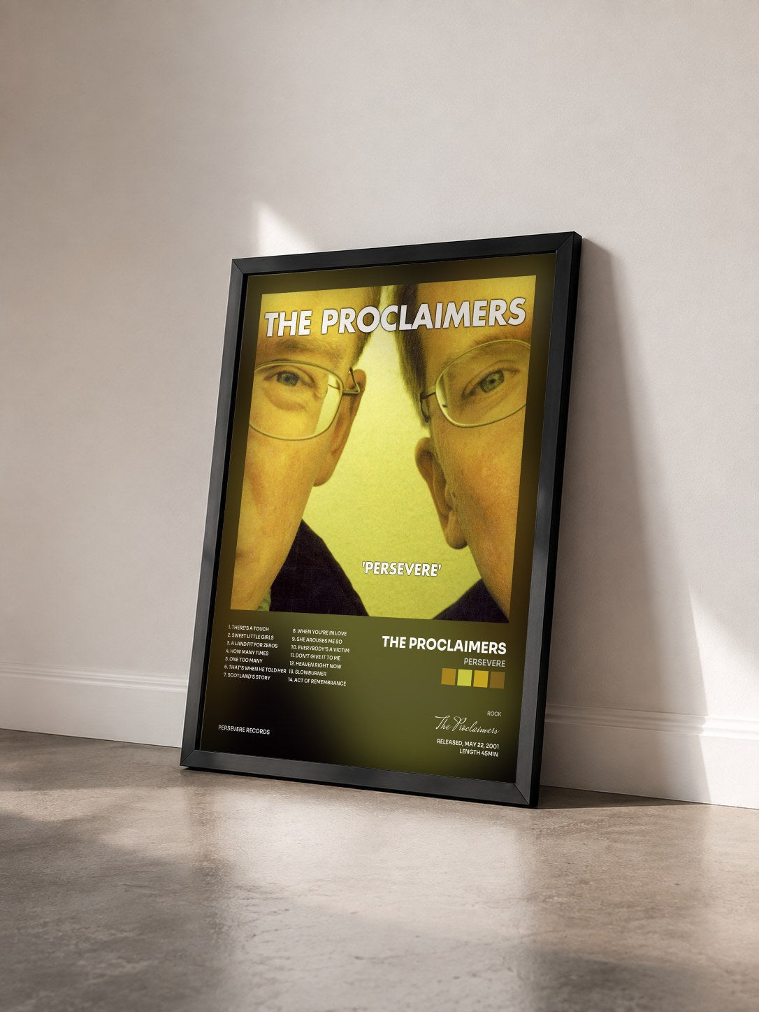 #noir Tableau de l'album Persevere de The Proclaimers vu de trois quarts, cadre noir
