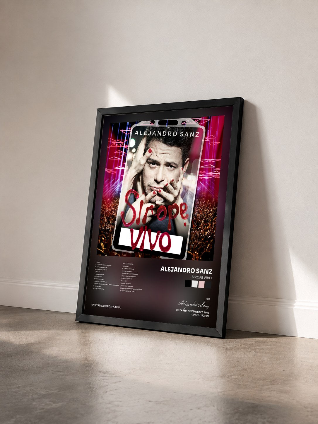 #noir Tableau de l'album Sirope Vivo de Alejandro Sanz vu de trois quarts, cadre noir
