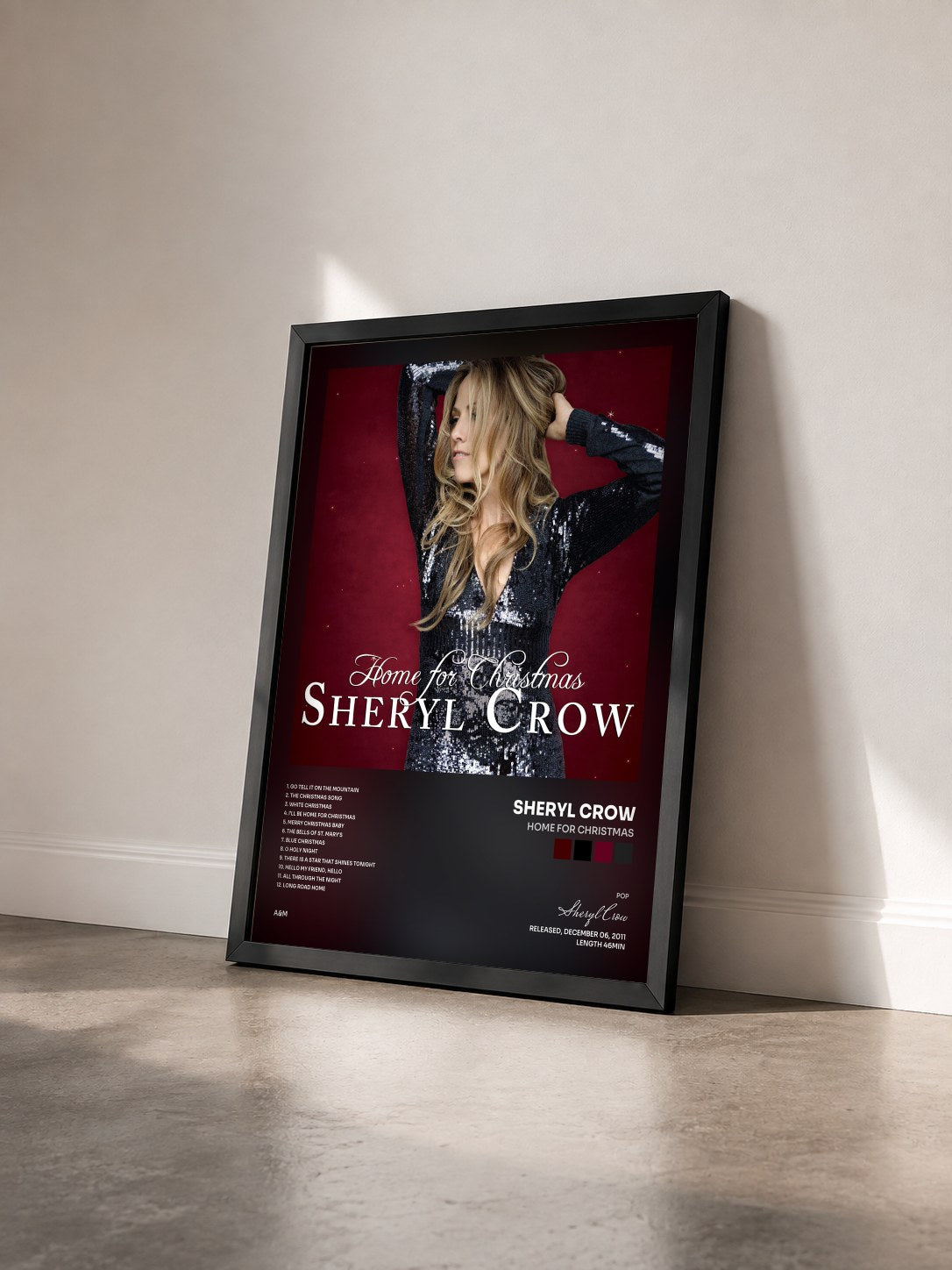 #noir Tableau de l'album Home For Christmas de Sheryl Crow vu de trois quarts, cadre noir