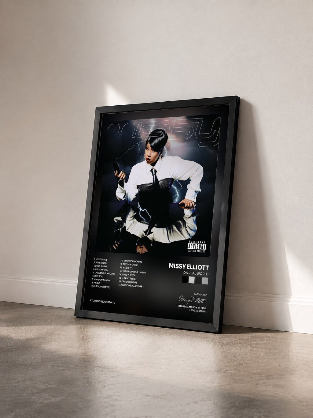 #noir Tableau de l'album Da Real World de Missy Elliott vu de trois quarts, cadre noir