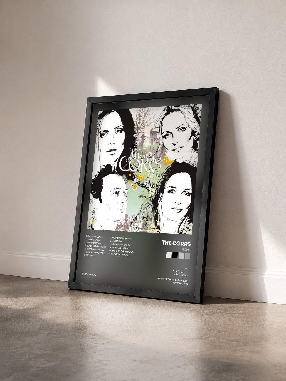 #noir Tableau de l'album Home de The Corrs vu de trois quarts, cadre noir