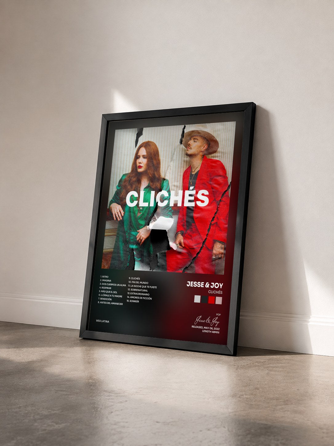 #noir Tableau de l'album Clichés de Jesse & Joy vu de trois quarts, cadre noir