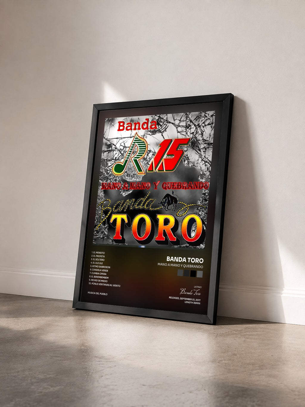 #noir Tableau de l'album Mano a Mano y Quebrando de Banda Toro vu de trois quarts, cadre noir