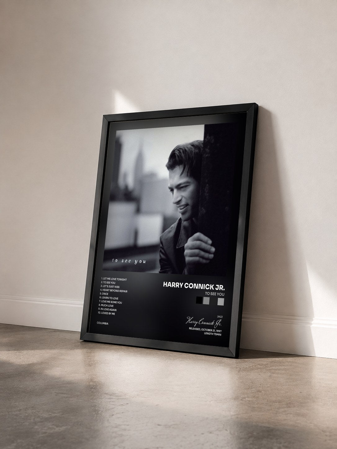 #noir Tableau de l'album To See You de Harry Connick Jr. vu de trois quarts, cadre noir