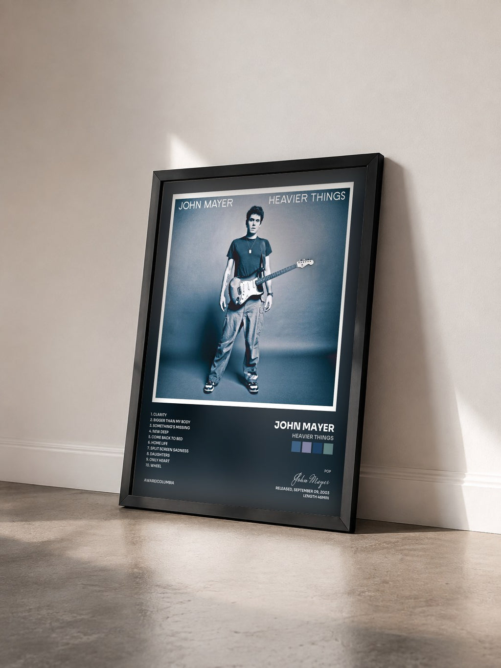 #noir Tableau de l'album Heavier Things de John Mayer vu de trois quarts, cadre noir