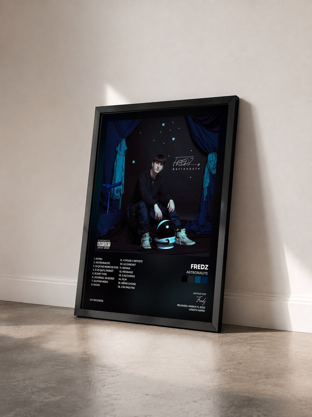 #noir Tableau de l'album Astronaute de Fredz vu de trois quarts, cadre noir