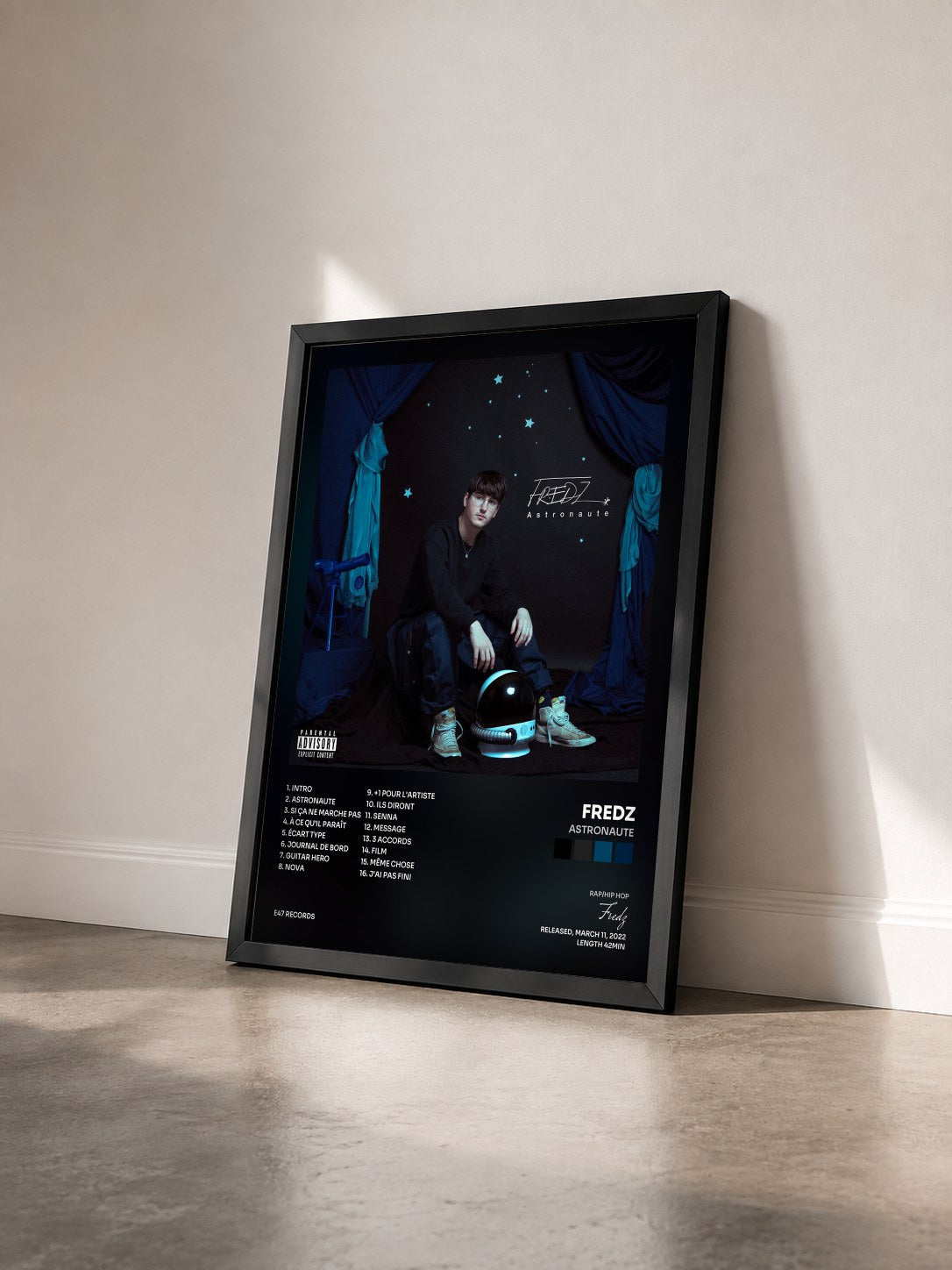 #noir Tableau de l'album Astronaute de Fredz vu de trois quarts, cadre noir