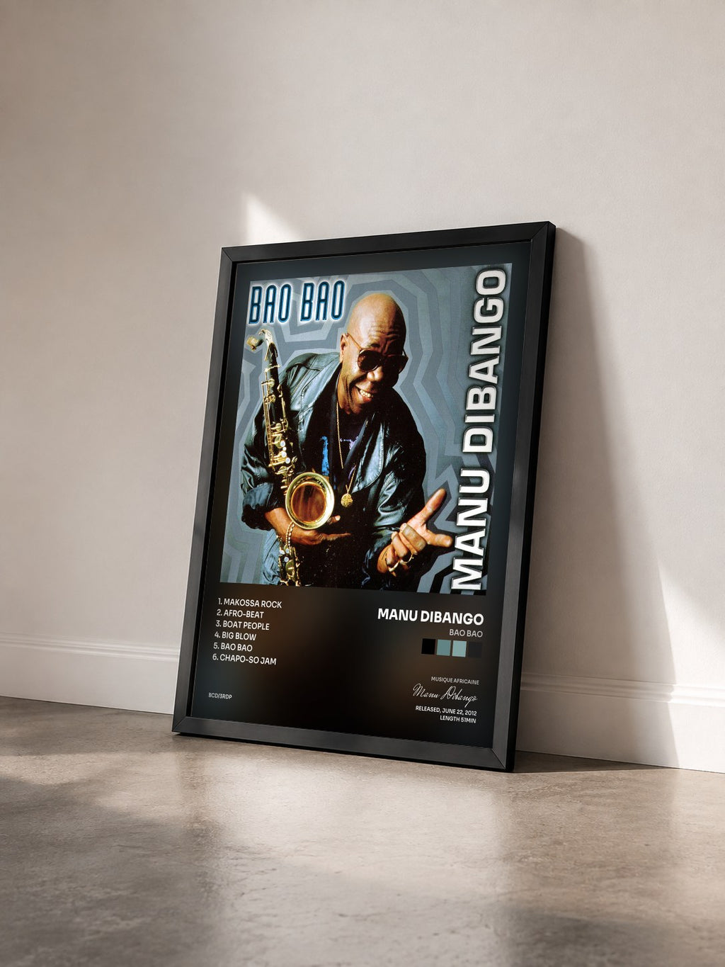 #noir Tableau de l'album Bao Bao de Manu Dibango vu de trois quarts, cadre noir