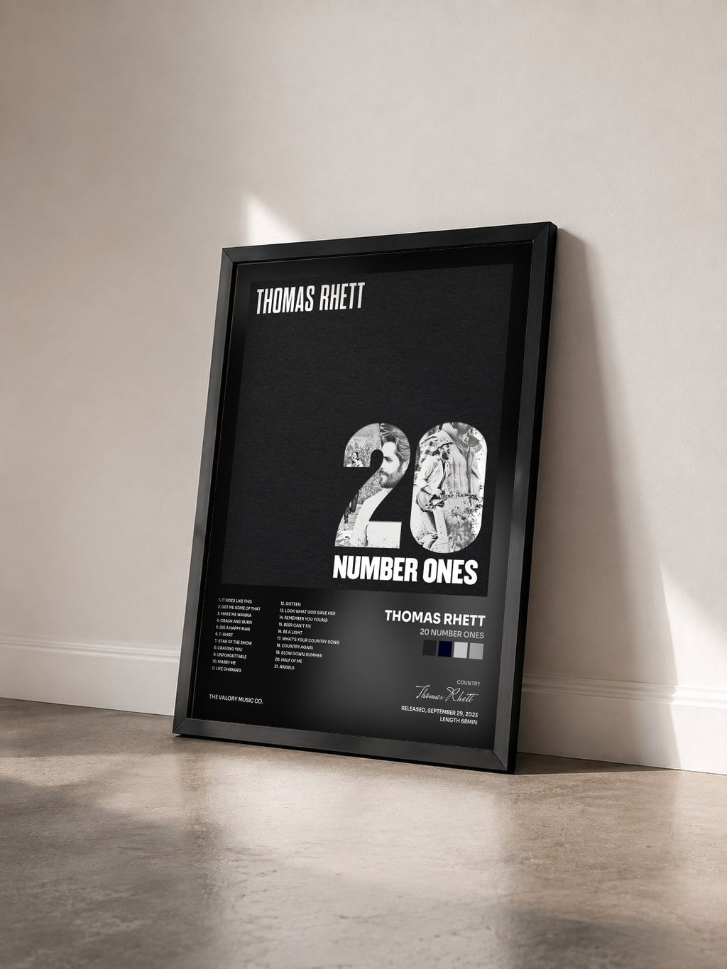 #noir Tableau de l'album 20 Number Ones de Thomas Rhett vu de trois quarts, cadre noir