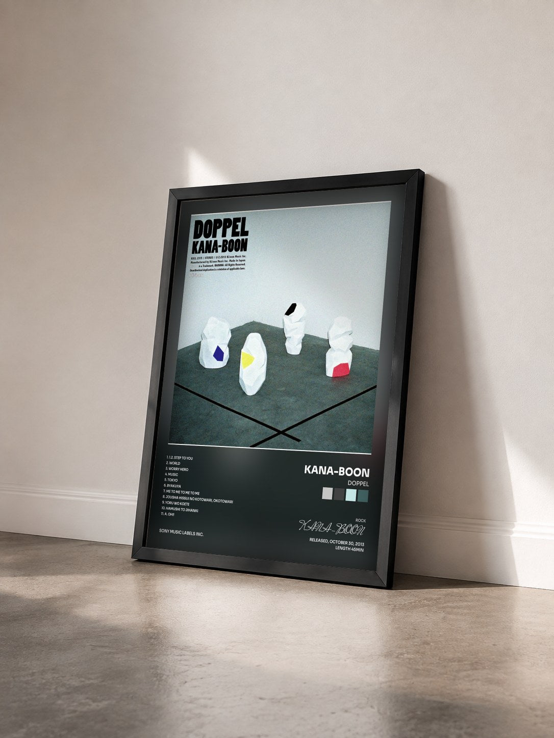 #noir Tableau de l'album DOPPEL de KANA-BOON vu de trois quarts, cadre noir