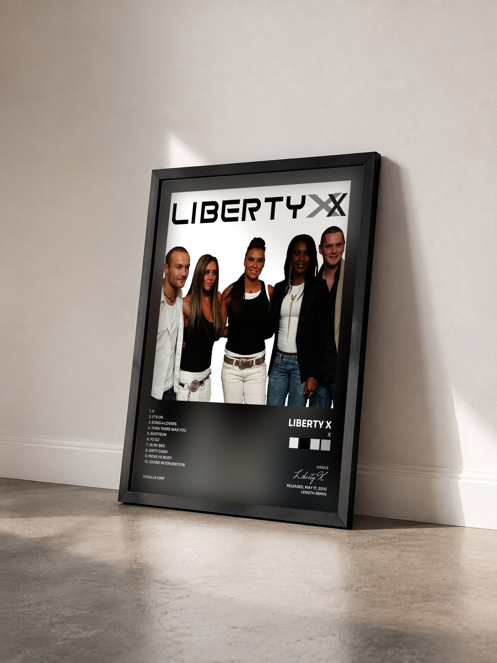 #noir Tableau de l'album X de Liberty X vu de trois quarts, cadre noir