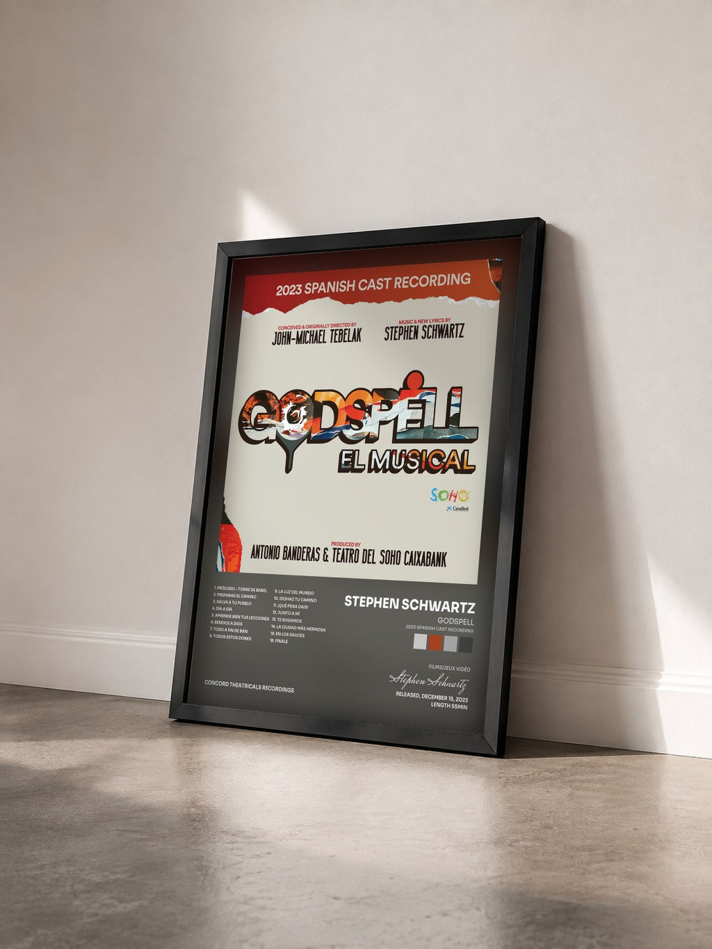 #noir Tableau de l'album Godspell (2023 Spanish Cast Recording) de Stephen Schwartz vu de trois quarts, cadre noir
