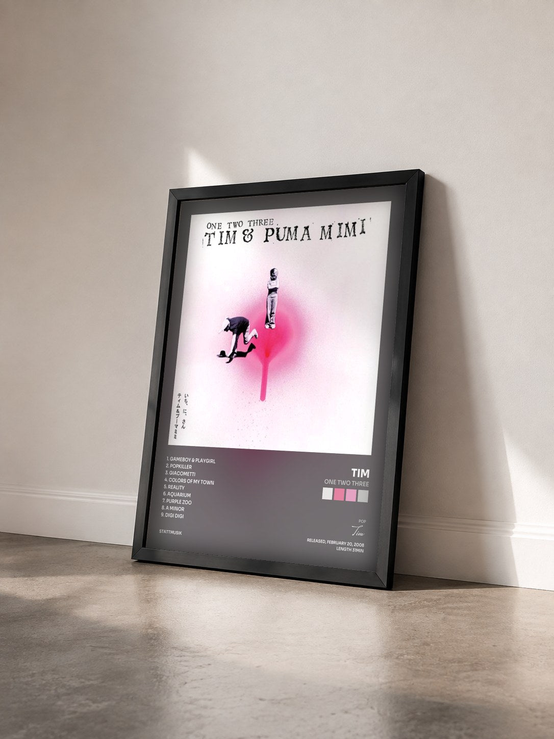 #noir Tableau de l'album One Two Three de Tim vu de trois quarts, cadre noir