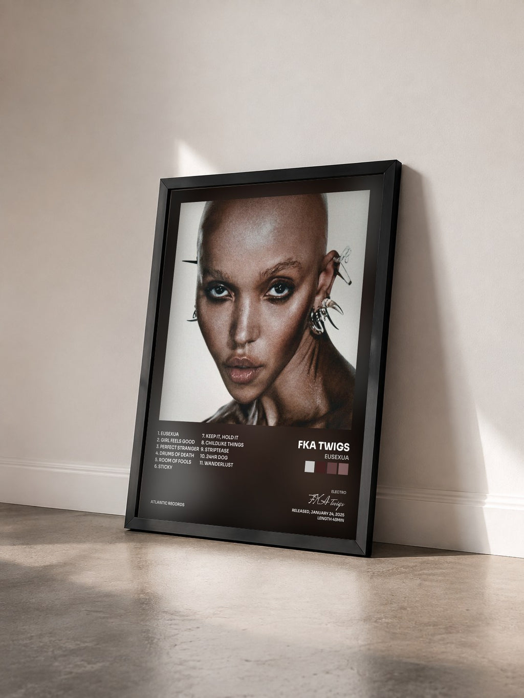 #noir Tableau de l'album EUSEXUA de FKA twigs vu de trois quarts, cadre noir