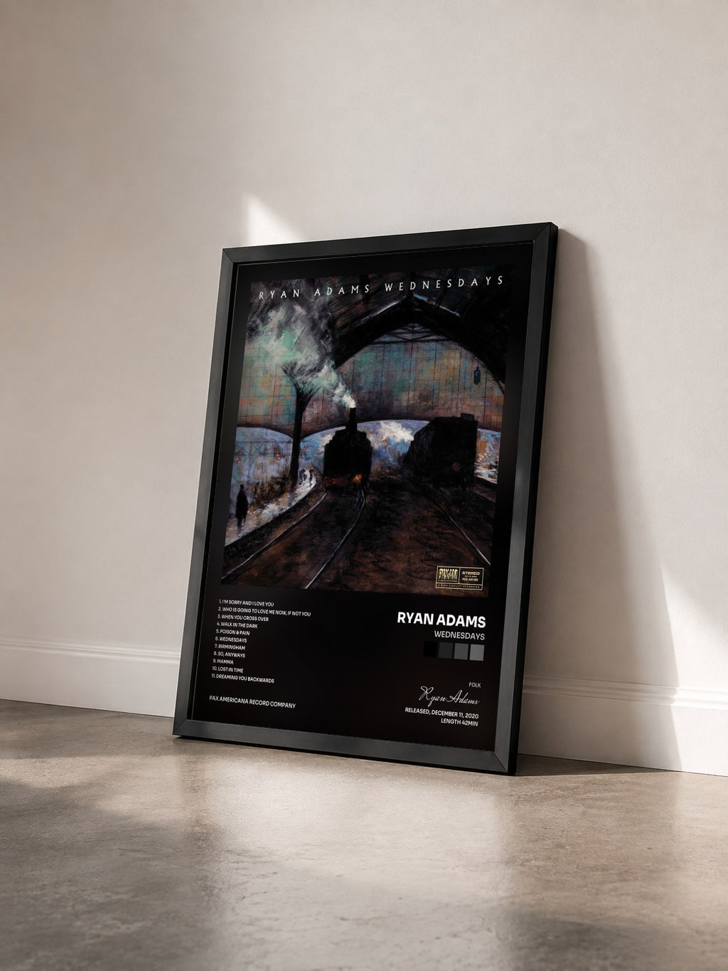 #noir Tableau de l'album Wednesdays de Ryan Adams vu de trois quarts, cadre noir