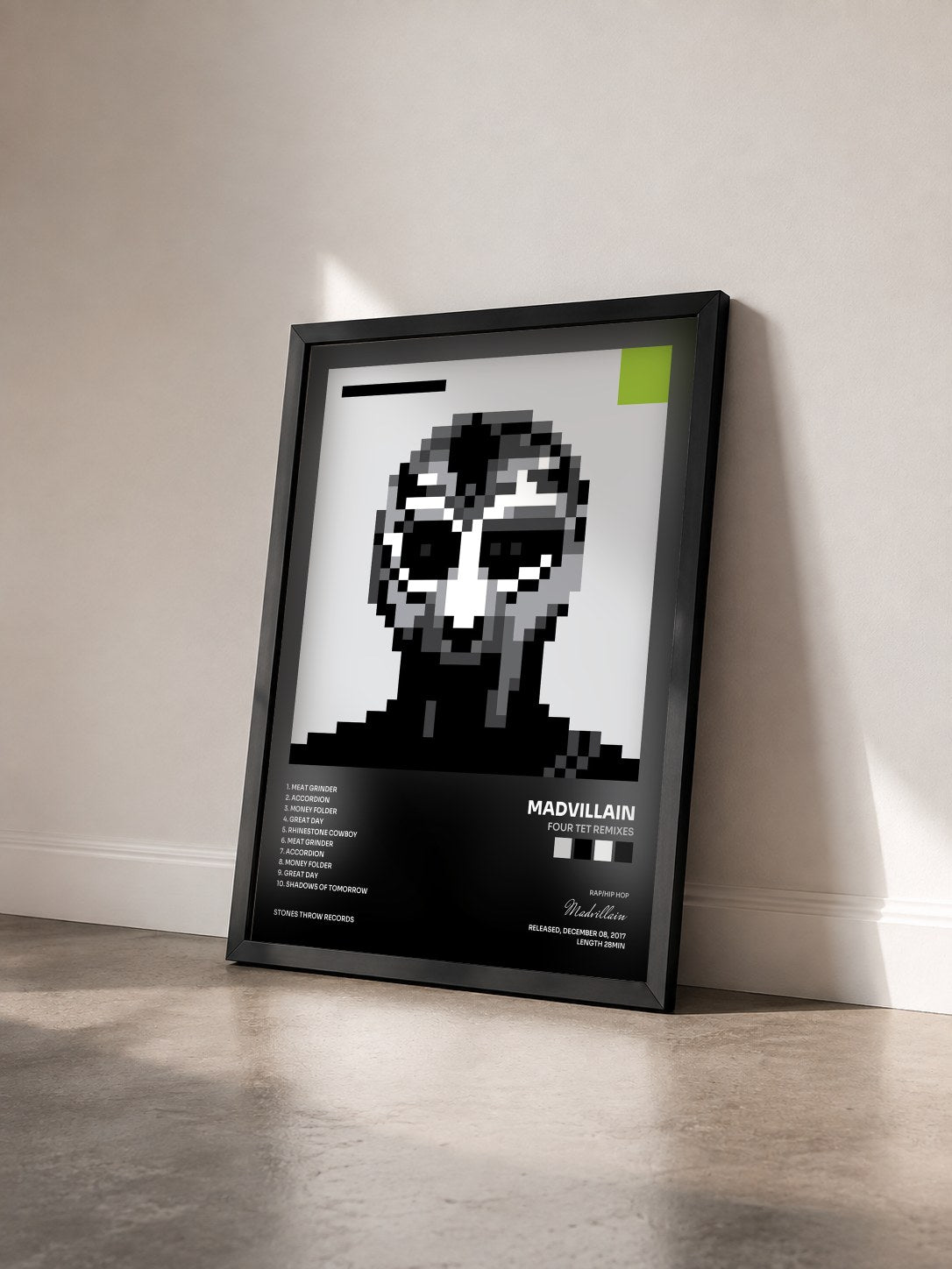 #noir Tableau de l'album Four Tet Remixes de Madvillain vu de trois quarts, cadre noir