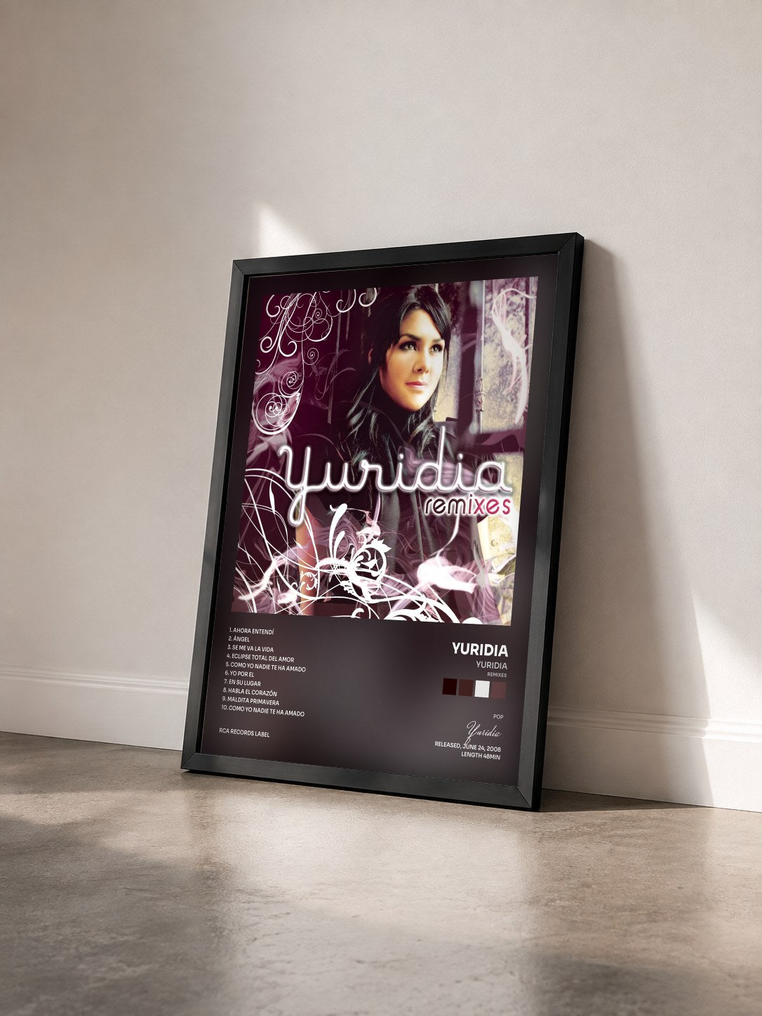 #noir Tableau de l'album Yuridia (Remixes) de Yuridia vu de trois quarts, cadre noir