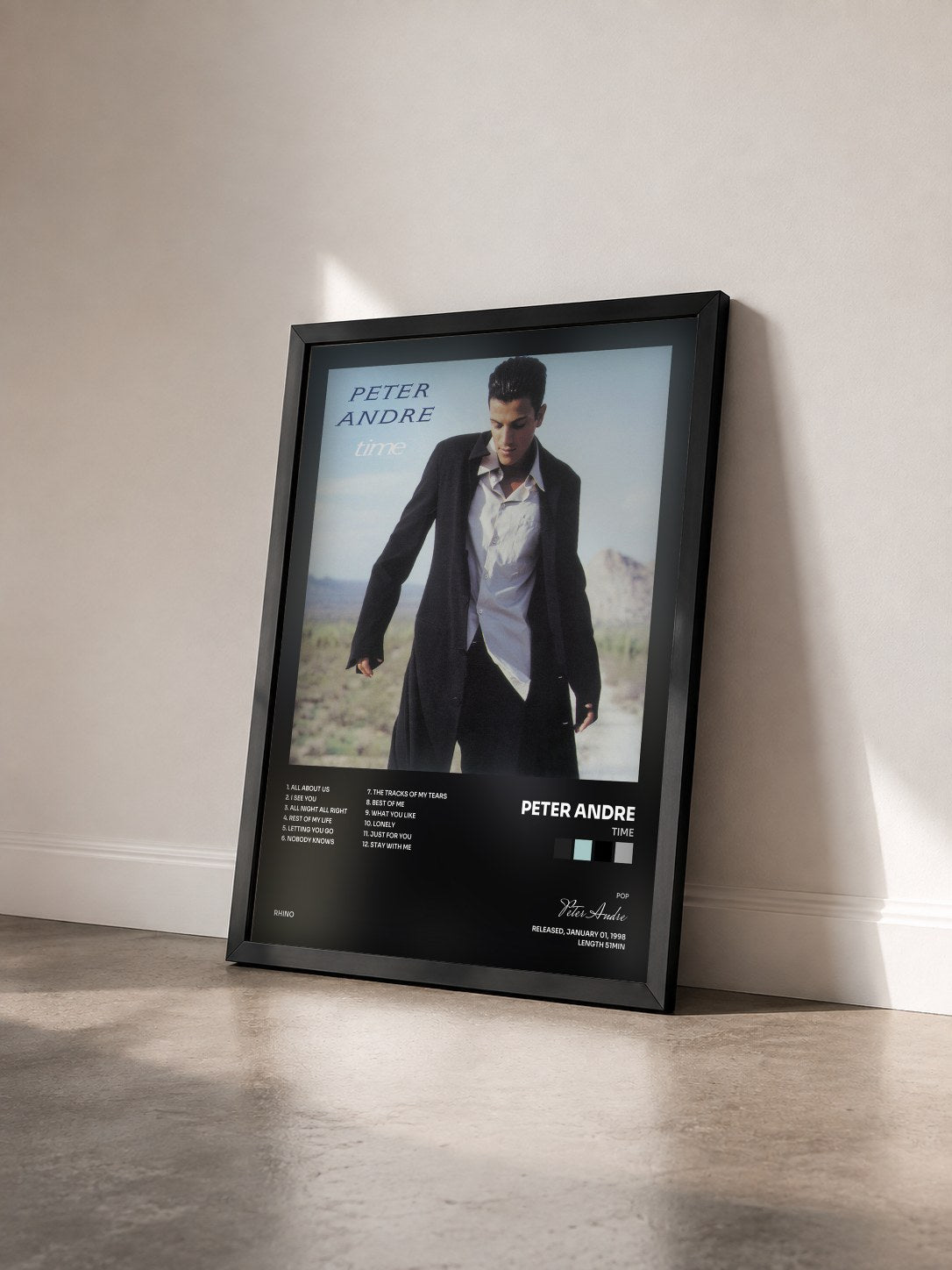 #noir Tableau de l'album Time de Peter Andre vu de trois quarts, cadre noir