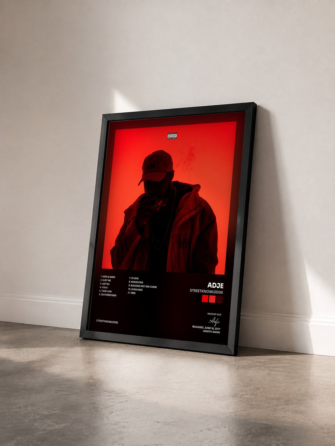#noir Tableau de l'album Streetknowledge de Adje vu de trois quarts, cadre noir