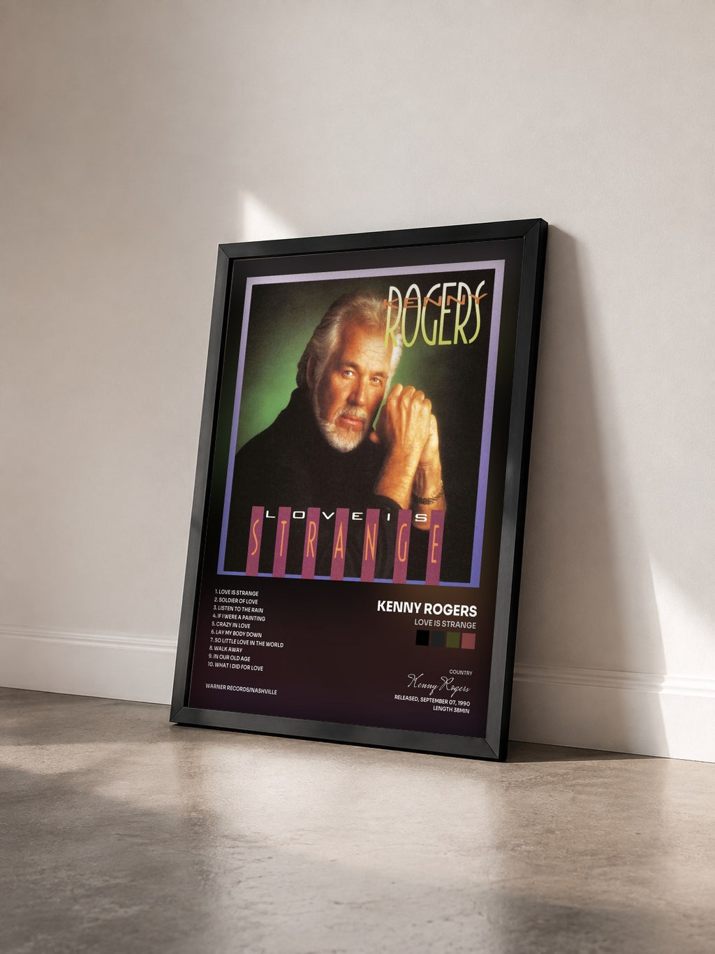 #noir Tableau de l'album Love Is Strange de Kenny Rogers vu de trois quarts, cadre noir