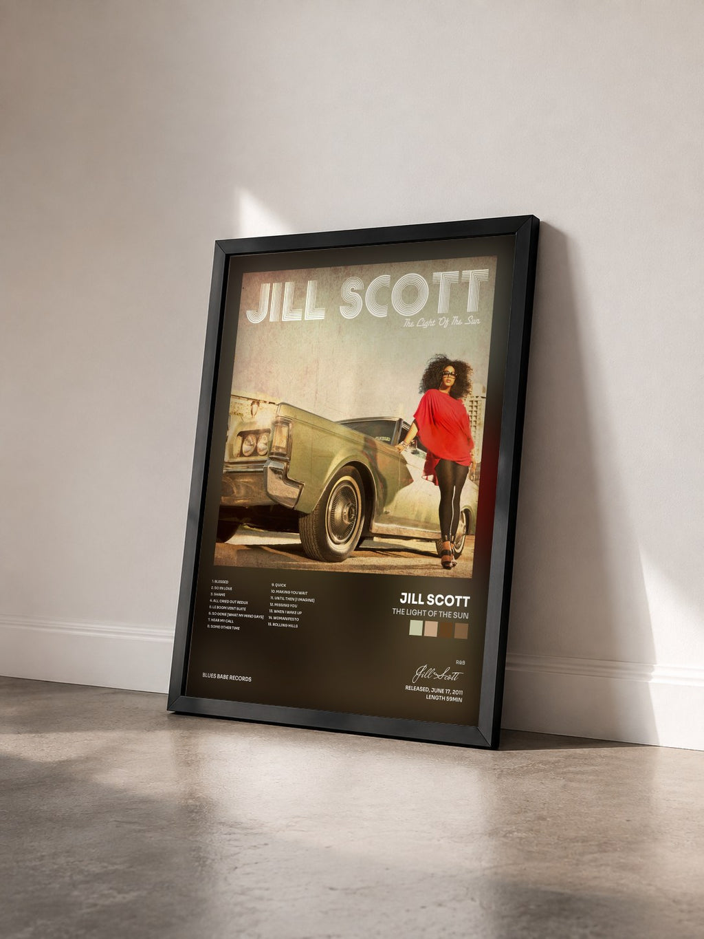 #noir Tableau de l'album The Light of the Sun de Jill Scott vu de trois quarts, cadre noir