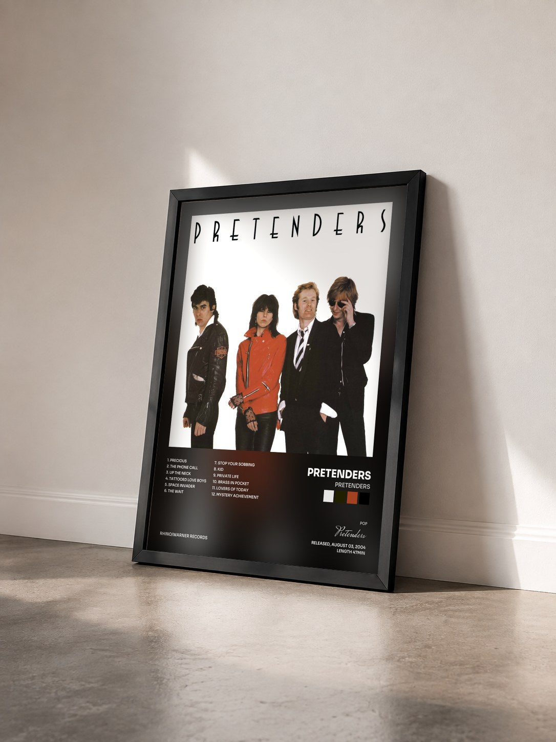 #noir Tableau de l'album Pretenders de Pretenders vu de trois quarts, cadre noir