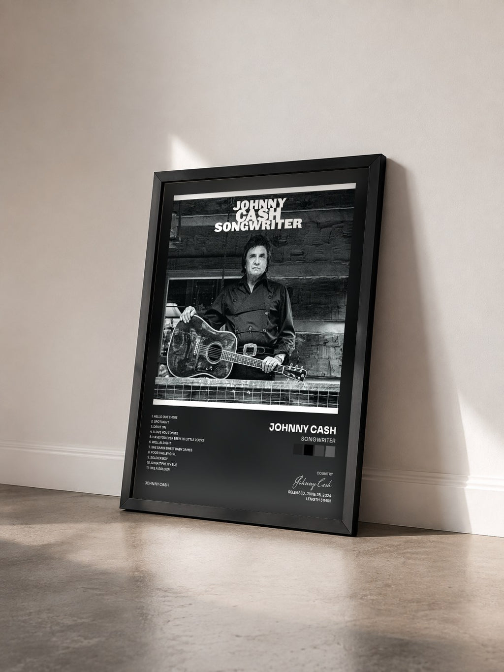 #noir Tableau de l'album Songwriter de Johnny Cash vu de trois quarts, cadre noir