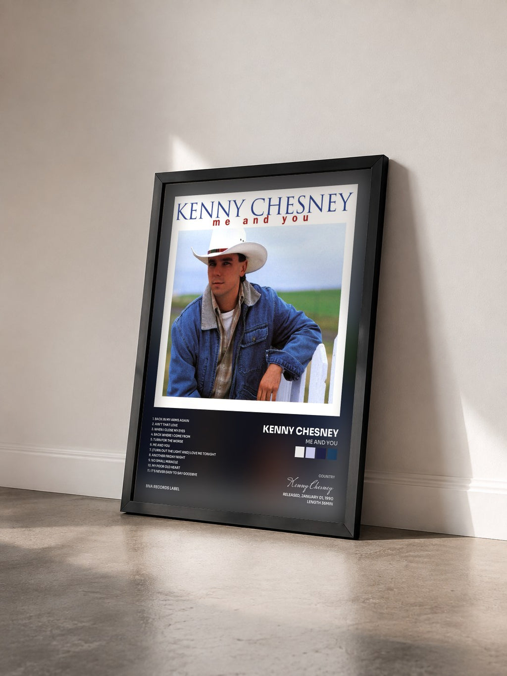 #noir Tableau de l'album Me And You de Kenny Chesney vu de trois quarts, cadre noir