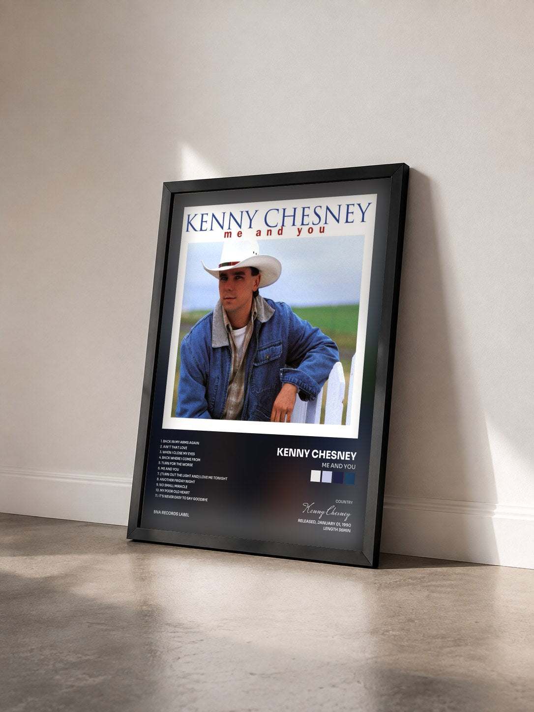 #noir Tableau de l'album Me And You de Kenny Chesney vu de trois quarts, cadre noir