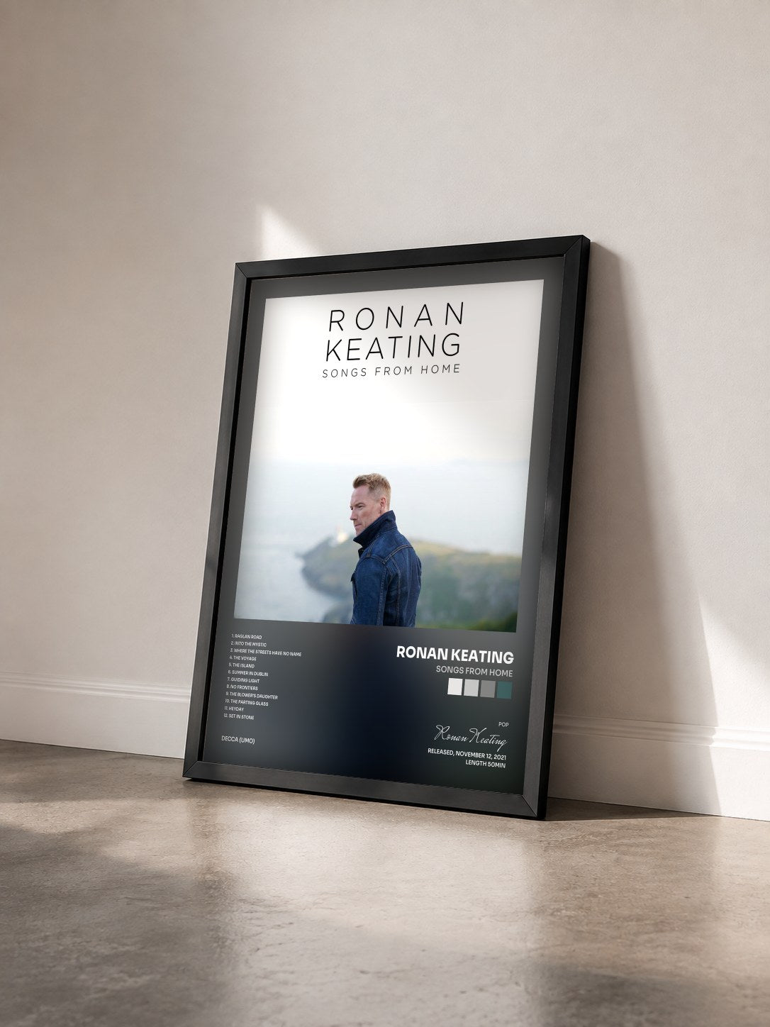 #noir Tableau de l'album Songs From Home de Ronan Keating vu de trois quarts, cadre noir