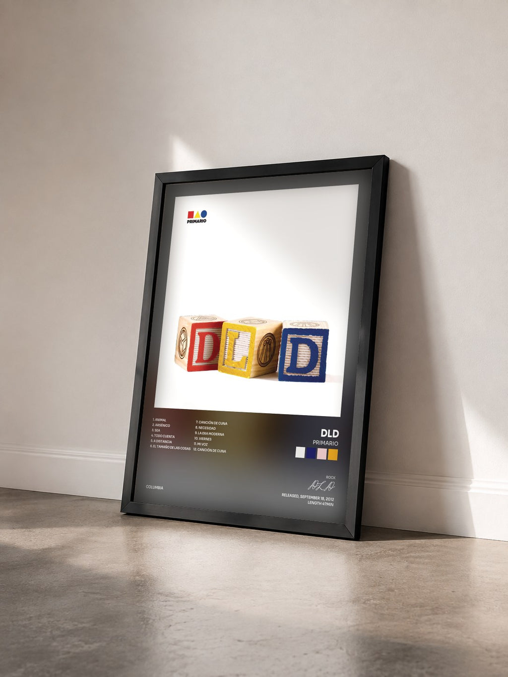 #noir Tableau de l'album Primario de DLD vu de trois quarts, cadre noir